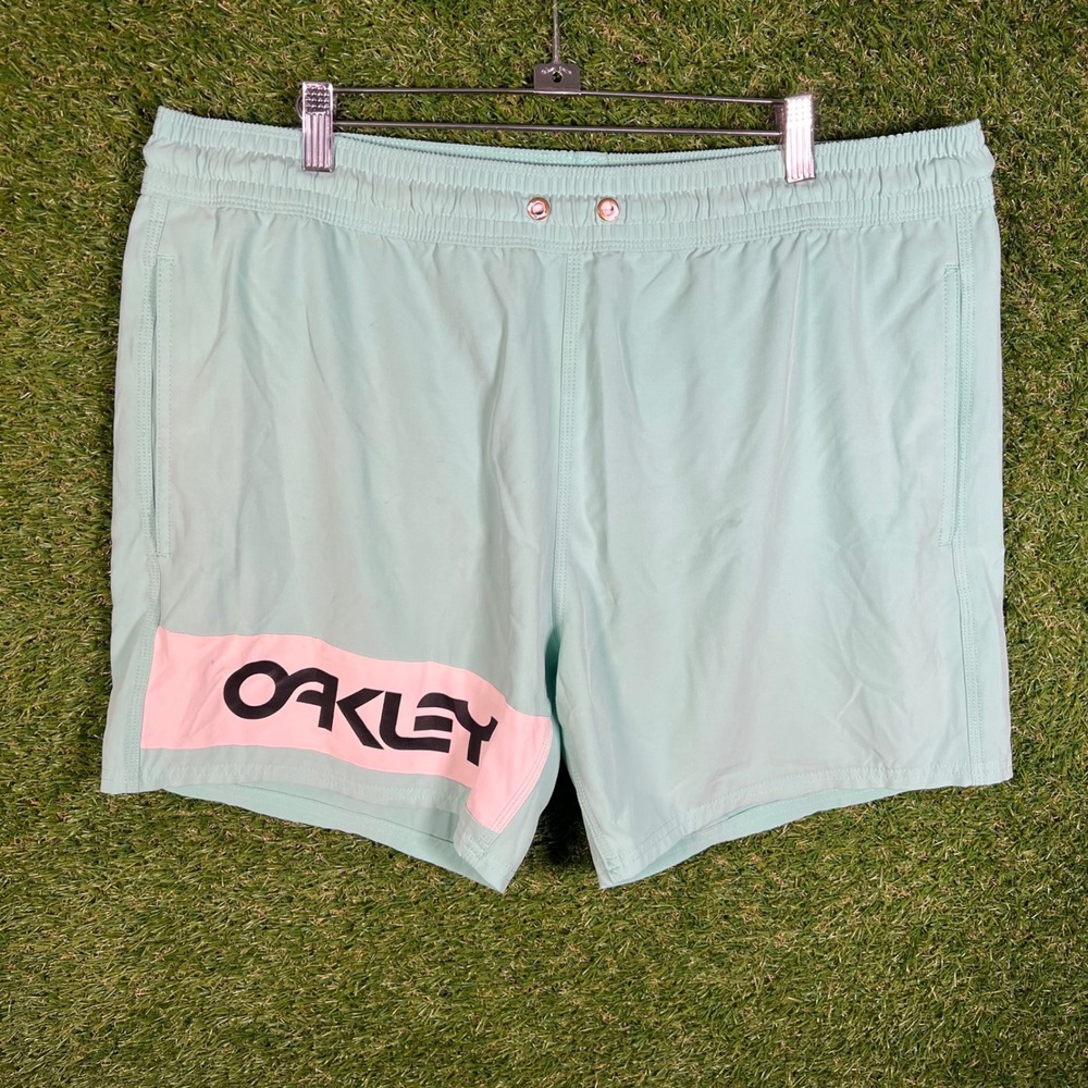 Oakley Mens XL‎ Mint Green Pink Logo Board Shorts Swim Trunks Mesh Lined 3465